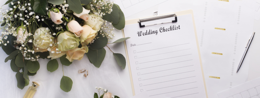 Preparation of wedding. Empty checklist with planner and bouquet of roses on white background